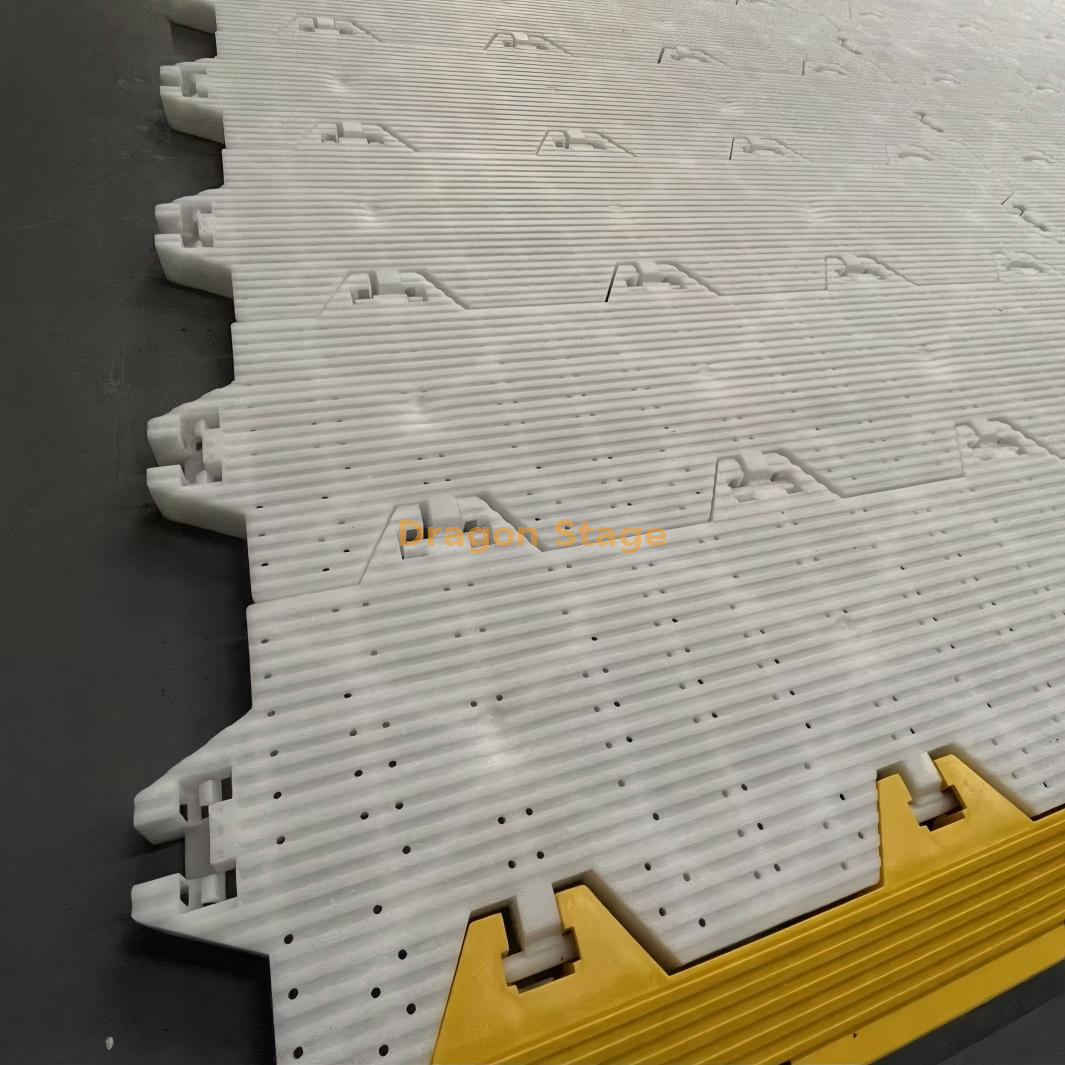 Portable event flooring for grass and soft ground