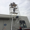 Portable bracket with climbing ladder