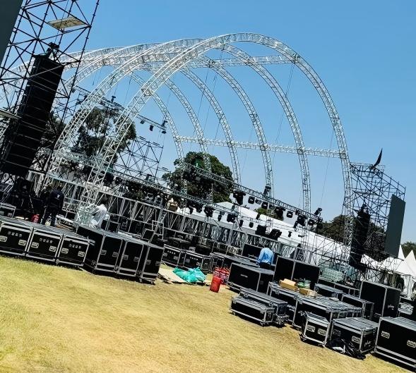 Large Multi-Arch Curved Aluminum Truss Structure with Event Stage.jpg