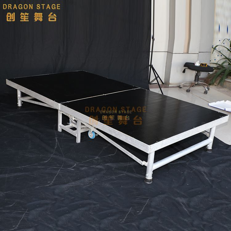 folding stage (27)