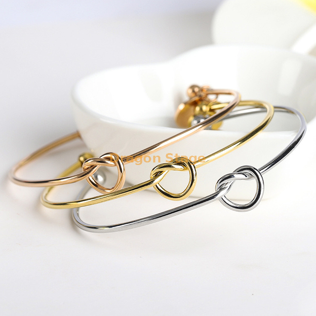 2020 Hot Fashion Wholesale Initial Lucky Charm Jewelry Ip Plated Gold Women Stainless Steel Cuff Knot Bracelet Bangle