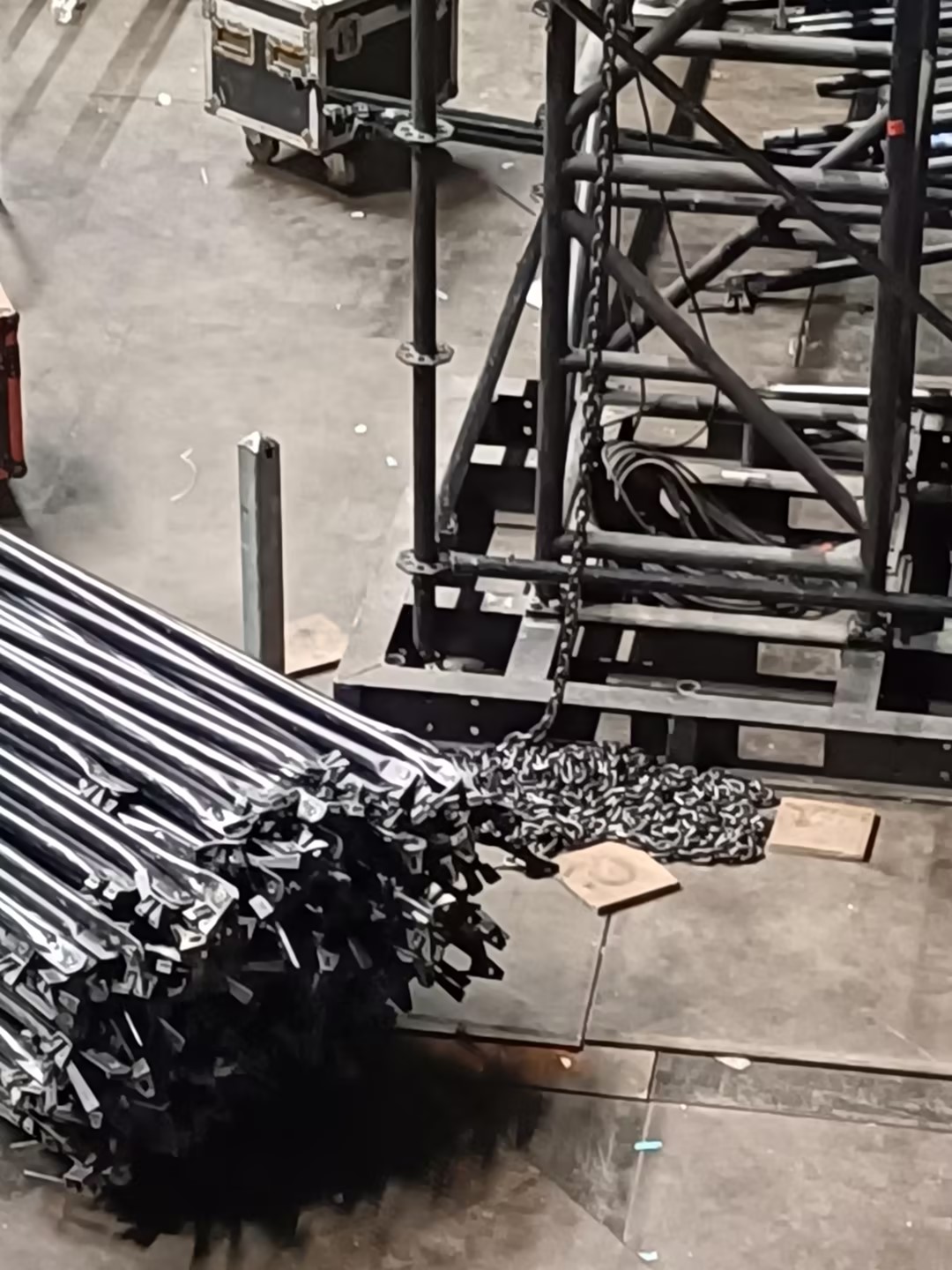 The iron base should have holes left for future construction of the layher truss frame